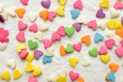 Scattered candy hearts Stock Photos