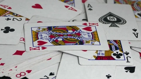 Scattered cards rotating on the table Stock Footage 73277337