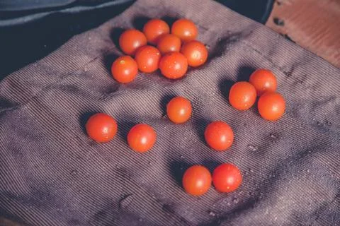Scattered cherry tomatoes Stock Photos