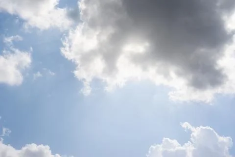 Scattered cloud clusters in a blue sky, blue sky background with white clouds Stock Photos