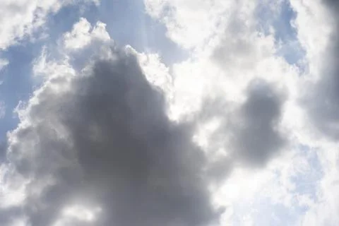 Scattered cloud clusters in a blue sky, blue sky background with white clouds Stock-Fotos