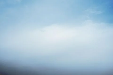 Scattered cloud clusters in a blue sky, blue sky background with white clouds Foto stock