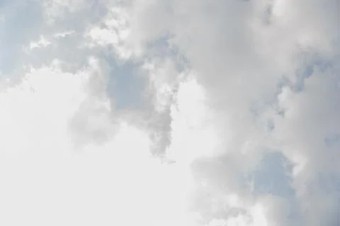 Scattered cloud clusters in a blue sky, blue sky background with white clouds Stock-Fotos