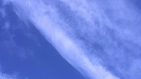 Scattered clouds in the blue sky Stock Footage 249325348