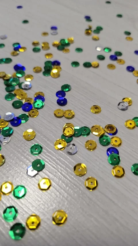 Scattered Colorful Sequins on Floor for Material Science Research and Polymer Stock Footage 330955954