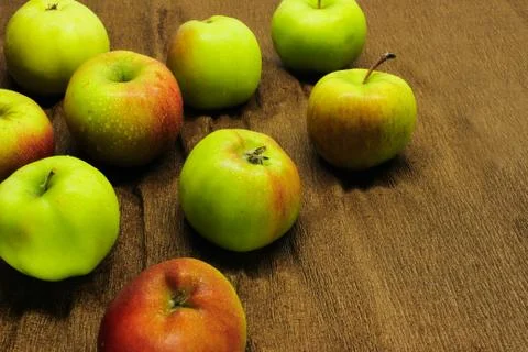 Scattered green apples Stock Photos