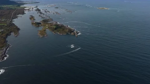 Scattered islets dot the Atlantic coast of Norway, aerial perspective Stock Footage 320731930