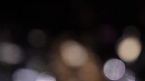 Scattered lights with low brightness in multi-colored blackness Stock Footage 318675279