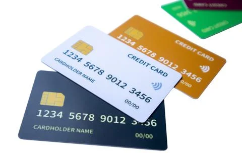 Scattered multi-colored credit and debit cards on a white background Stock Photos