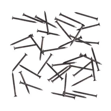 Scattered nails over surface isolated over white background Stock Photos
