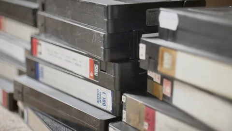Scattered old VHS tapes Stock Footage 75102459