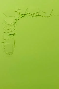 Scattered paper scrap on the same colour surface with copy space Stock Photos