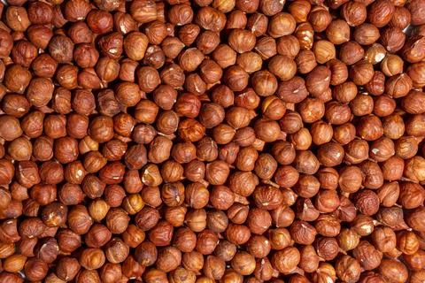 Scattered Peeled Hazelnut. Background from Hazelnuts Stock Photos