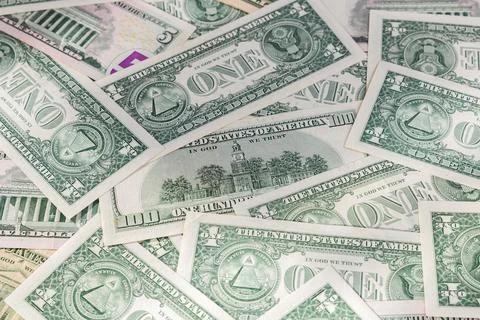 Scattered Pile of Various US Dollar Bills: 1, 5, 20, and 100 Denominations Stock Photos