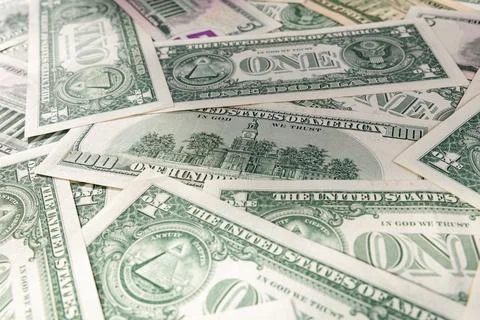 Scattered Pile of Various US Dollar Bills: 1, 5, 20, and 100 Denominations Stock Photos