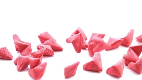Scattered Pink Triangular Pharmaceutical Tablets on White Background Stock Footage 310818205