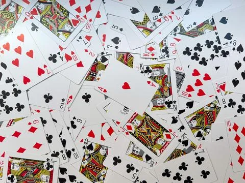 Scattered playing cards Stock Photos