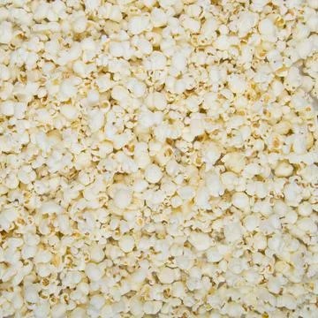 Scattered popcorn texture background Stock Photos