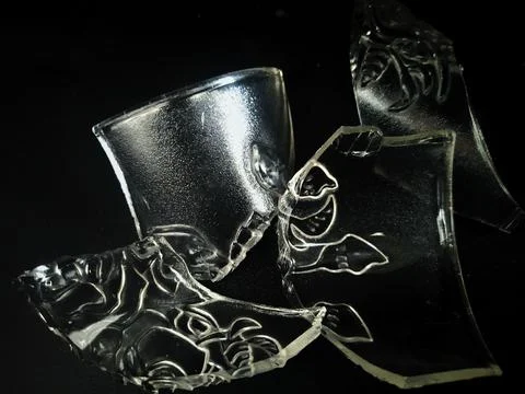 Scattered Sharp Glass Shards on Dark Surface 1 写真素材