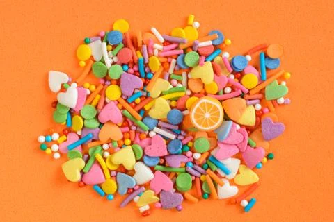 Scattered small candies Stock Photos