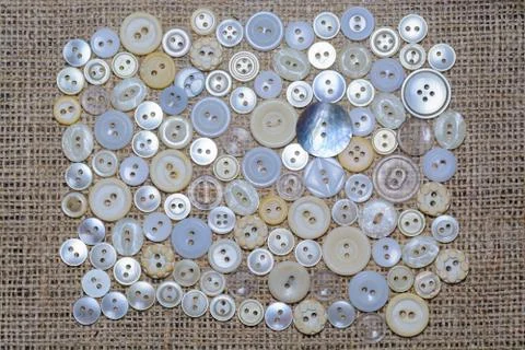 Scattered on textile buttons Stock Photos