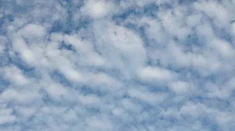 Scattered White Clouds and Blue Sky Background Foto stock