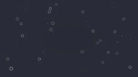 Scattered white rings and circle outlines float on a solid dark navy blue f.. Vídeo Stock 344809435