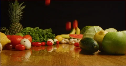 Scattering cherry tomatoes on table with composition of fruits and vegetable 動画素材 126301609