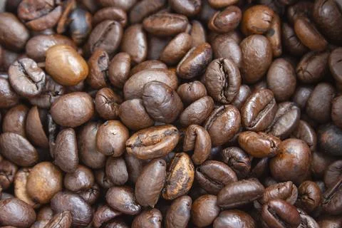 A scattering of coffee beans, texture Stock Photos