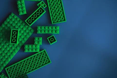 A scattering of constructor elements for children. Colored bricks from the .. Stock Photos