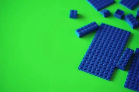 A scattering of constructor elements for children. Colored blue bricks from.. Stock Photos