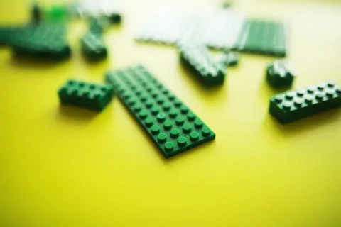A scattering of constructor elements for children. Colored bricks from the .. Stock Photos