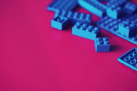 A scattering of constructor elements for children. Colored blue bricks from.. Foto stock