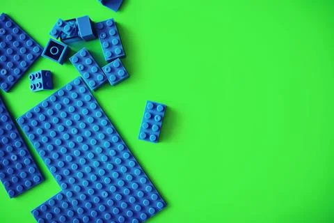 A scattering of constructor elements for children. Colored blue bricks from.. Stock Photos