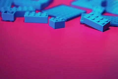 A scattering of constructor elements for children. Colored blue bricks from.. Foto stock