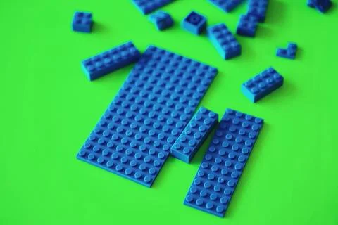 A scattering of constructor elements for children. Colored blue bricks from.. Stock Photos
