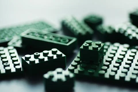 A scattering of constructor elements for children. Colored bricks from the .. Stock Photos