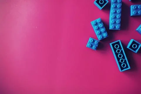 A scattering of constructor elements for children. Colored blue bricks from.. 스톡 사진