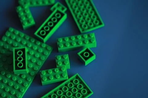 A scattering of constructor elements for children. Colored bricks from the .. Stock Photos