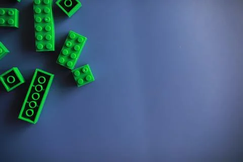 A scattering of constructor elements for children. Colored bricks from the .. Stock Photos