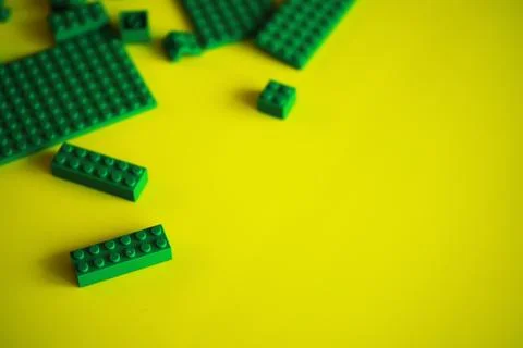 A scattering of constructor elements for children. Colored bricks from the .. 스톡 사진