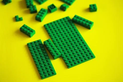 A scattering of constructor elements for children. Colored bricks from the .. Stock Photos
