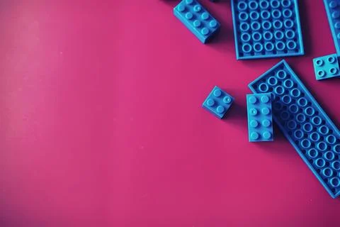 A scattering of constructor elements for children. Colored blue bricks from.. 스톡 사진