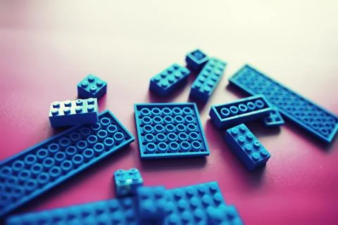 A scattering of constructor elements for children. Colored blue bricks from.. Foto stock