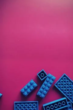A scattering of constructor elements for children. Colored blue bricks from.. Foto stock