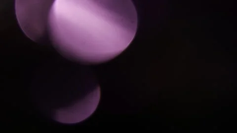 A scattering of dazzling colored bokeh lights Vidéo 309795710