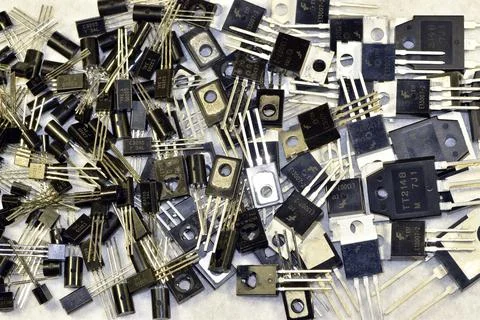 A scattering of different types of semiconductor triodes. The kit contains a  Stock Photos