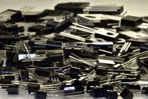 A scattering of different types of semiconductor triodes. The kit contains a  Stock Photos