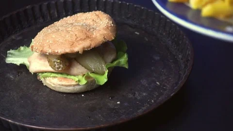 Scattering fried chips in a plate Stock Footage 72960254