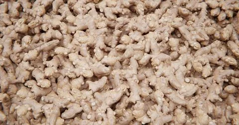 A scattering of ginger. Background with vegetables Stock Photos